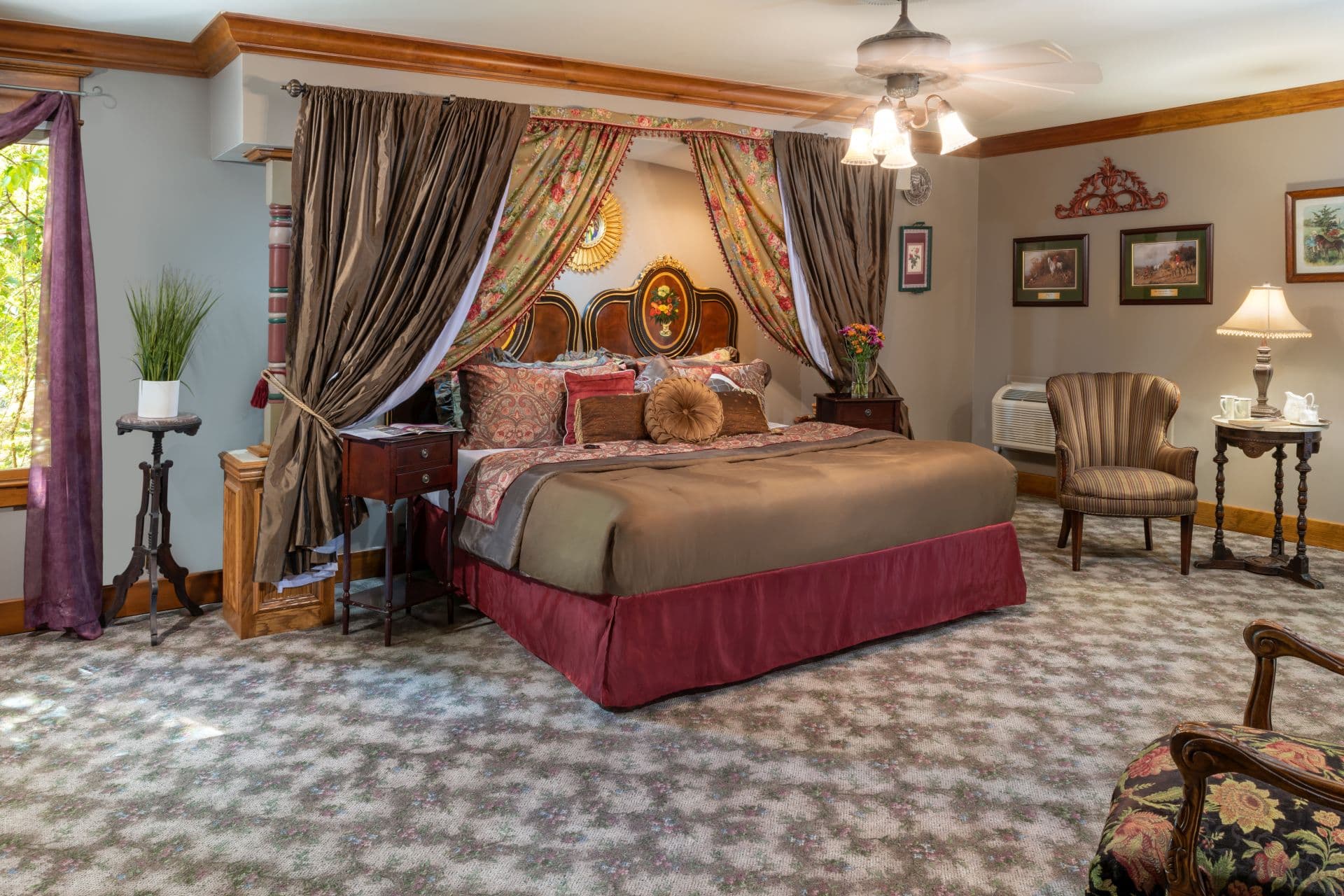 Luxurious bedroom with elegant king-size bed draped with designer linens.